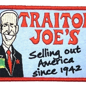 May include: A red, white, and blue embroidered patch with a cartoon image of Joe Biden and the text "Traitor Joe's Selling out America since 1942".