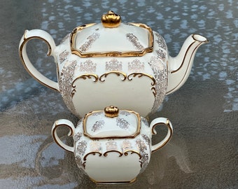 Vintage jaren 1940 iriserende crème gouden kubus-zadeldoos 2332 parelglans theepot en suikerpotset