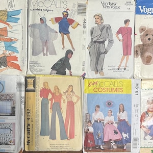 May include: A collection of vintage sewing patterns for clothing and home decor. The patterns feature a variety of styles, including dresses, blouses, trousers, and curtains. The patterns are from different brands, including McCall's and Vogue.