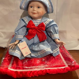 Porcelain Baby Girl Doll “Amanda” in Sailor Suit