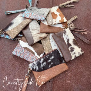 Bolso de mano de piel de vaca Rustic Couture de Countryside Co.