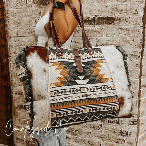 Cowhide weekender bag hotsell