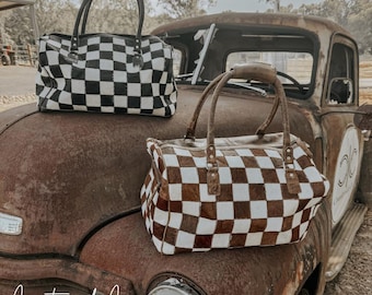 Reckless Checkered Cowhide Duffle Bag