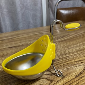 Egg poacher cooker stainless steel yellow plastic kitchen helper gadget breakfast necessity eggs yummy nutritious useful delicious