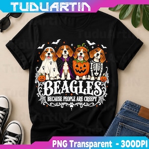 May include: A black short-sleeved t-shirt featuring a graphic of four beagle dogs in Halloween costumes, including a ghost, a vampire, a pumpkin, and a skeleton. The text reads BEAGLES BECAUSE PEOPLE ARE CREEPY, surrounded by bats and webs.