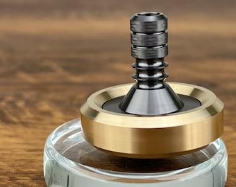 Zirconium Spinning Top, Brass Collar with Zirconium Stem, Average 8-12 Minutes, Best Record 15+ Minutes