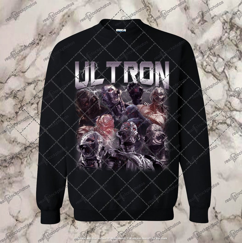 May include: Black sweatshirt with a graphic print of the Marvel character Ultron. The print features multiple versions of Ultron in a menacing pose. The text "ULTRON" is printed in white above the graphic.