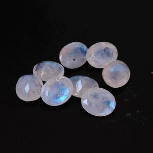 Natural Blue Flashy Rainbow Moonstone Oval Faceted 7x9mm AA Quality - Good Blue Flashy Moonstone Faceted
