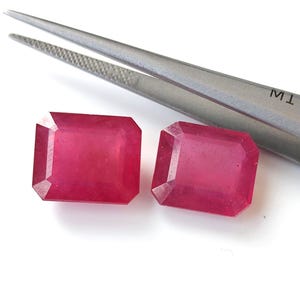 Natural Two Pc Lot 29.8 ctw Ruby Glass filled 12x14 Octagon Faceted AAA Quality