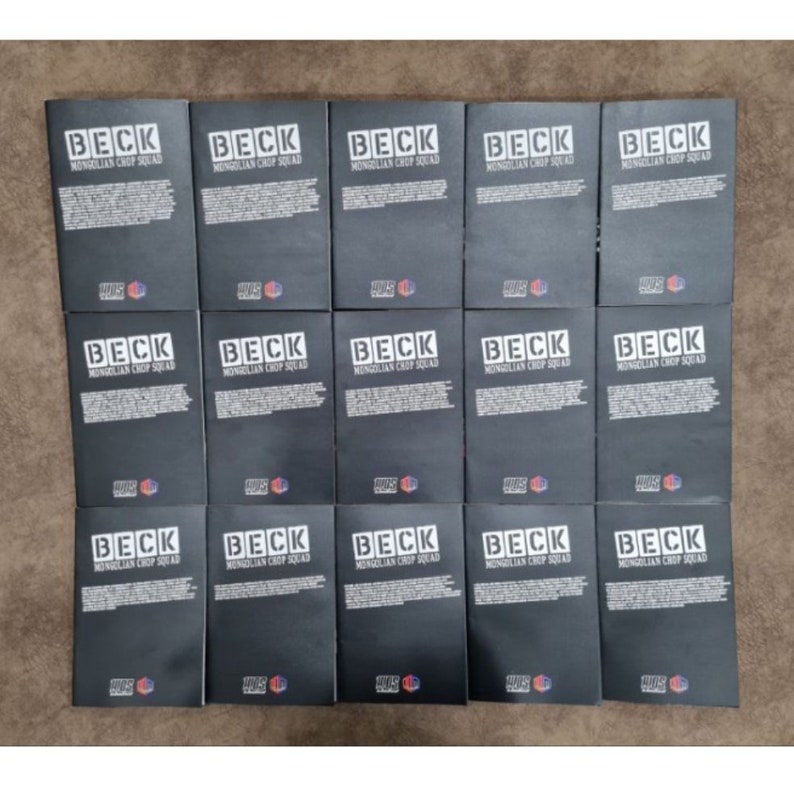 May include: A stack of 15 black books with the title "BECK MONGOLIAN CHOP SQUAD" printed in white on the front cover.