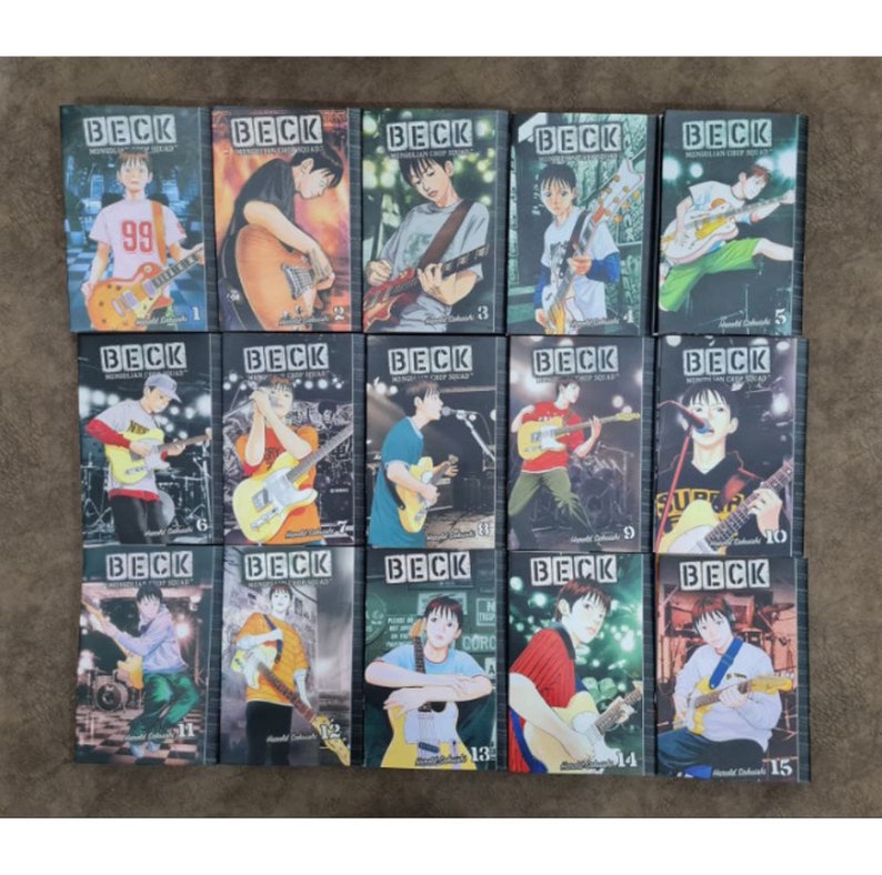 May include: A complete set of 15 manga volumes of BECK, a Japanese manga series about a group of high school students who form a rock band. The covers feature colorful illustrations of the band members playing their instruments.
