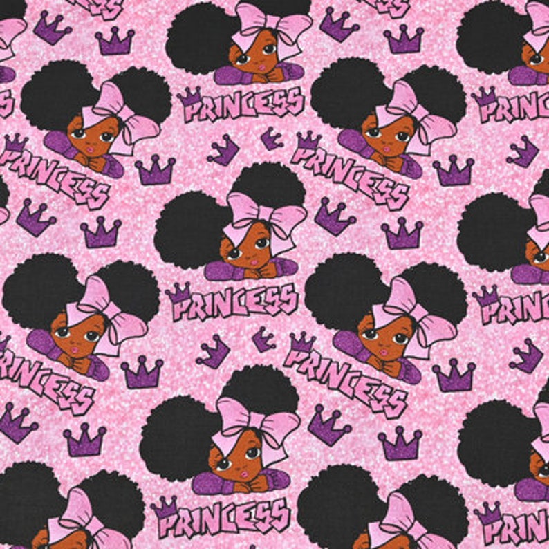 May include: Pink fabric with a repeating pattern of a black girl with pink bows and the word "Princess" in pink letters. The background is a sparkly pink.
