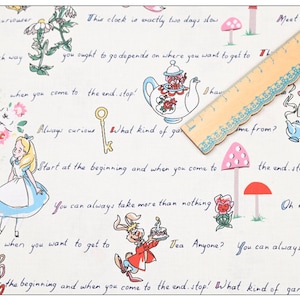 May include: White fabric with a whimsical Alice in Wonderland theme. The fabric features illustrations of Alice, the Mad Hatter, the White Rabbit, and other characters from the book. The fabric also includes text from the book, such as "Curioucer and curiouder" and "This clock is exactly two days slow."