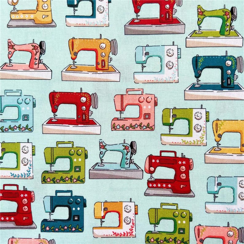 May include: A teal blue background with a repeating pattern of colorful vintage sewing machines. Each machine has a different color and design, including red, yellow, green, blue, and pink. The machines are decorated with floral details and have a whimsical, retro style.