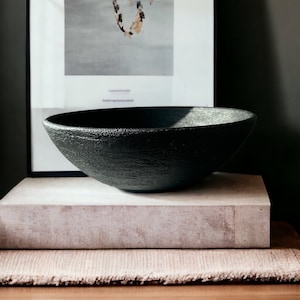 Black textured earthenware stoneware unglazed ceramic bowl aged and vintage looked perfect for shelf, coffee tables and dresser decoration