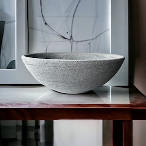 Gray textured earthenware stoneware unglazed ceramic bowl aged and vintage looked perfect for shelf, coffee tables and dresser decoration