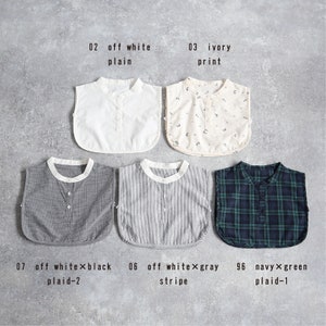 May include: Ten different styles of fabric collars, including plain, printed, plaid, and striped patterns. The collars are in various colors, including white, ivory, gray, black, and green.