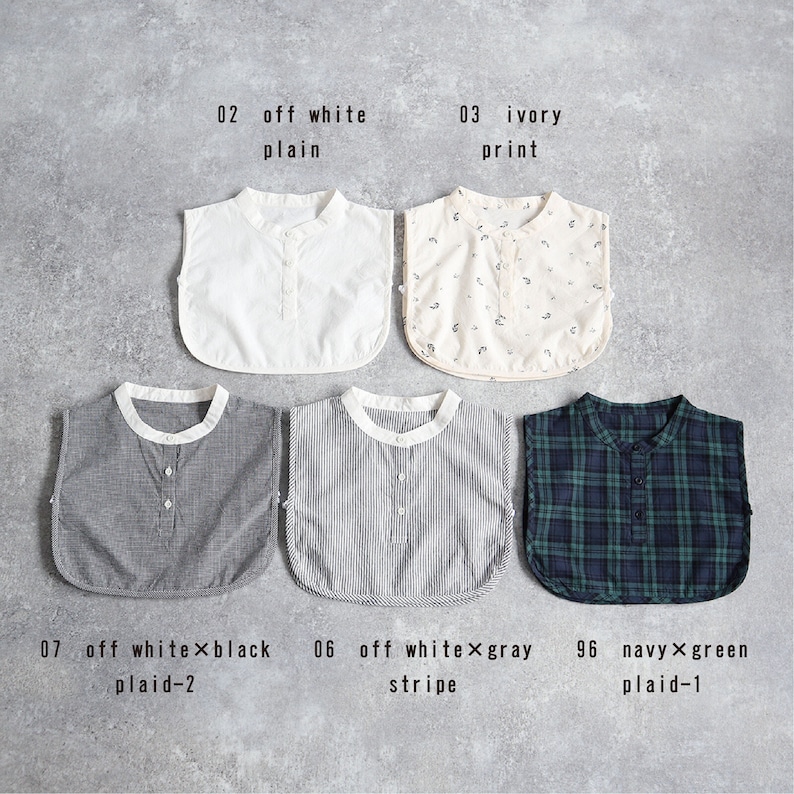 May include: Ten different styles of fabric collars, including plain, printed, plaid, and striped patterns. The collars are in various colors, including white, ivory, gray, black, and green.