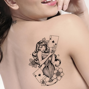Tatuaggio temporaneo "RAGAZZA CHE GIOCA" in nero. Osate abbracciare la scommessa della vita!