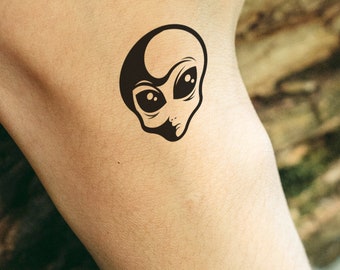 ALIEN HEAD temporary tattoo in black. Do you believe in extraterrestrial life?