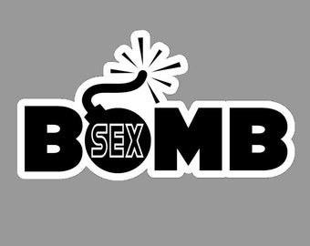 May include: A black and white sticker featuring the word BOMB in bold, capital letters. The letter O is replaced by a circular bomb graphic with a lit fuse and radiating lines. The word SEX is printed in white inside the circular bomb graphic.