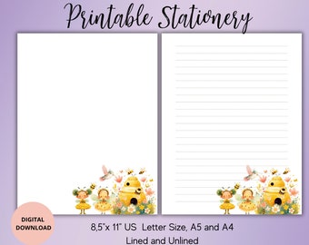 May include: Printable stationery featuring a beehive with two bee fairies and a hummingbird. The design is in yellow, brown, pink, and green. The paper is available in 8.5 x 11 inch US Letter size, A5 and A4, and comes in lined and unlined options.