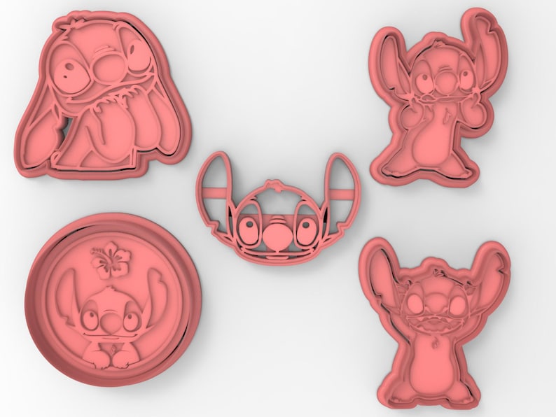 May include: Set of five pink plastic cookie cutters shaped like Stitch from the Disney movie Lilo & Stitch. The cutters feature Stitch in different poses, including a smiling Stitch with his arms crossed, a Stitch with his arms raised, and a Stitch with his head tilted.