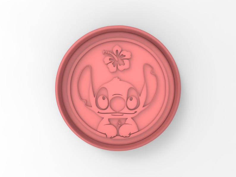 May include: Pink plastic cookie cutter shaped like Stitch from Lilo & Stitch, with a hibiscus flower above him.