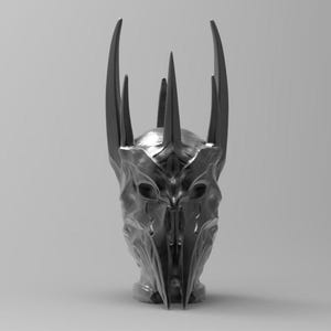 May include: A silver-colored helmet with a crown of sharp points. The helmet has a menacing, almost skeletal appearance.
