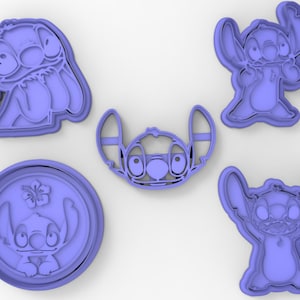 May include: Set of five blue plastic cookie cutters shaped like Stitch from the Disney movie Lilo & Stitch. The cutters are in various poses, including standing, sitting, and with a flower.