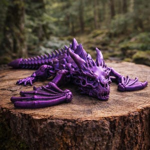 May include: A detailed, purple dragon figurine with intricate scales, horns, and wings, resting on a tree stump. The fantasy creature is posed in a relaxed position, showcasing its detailed design. The background features a blurred forest setting.