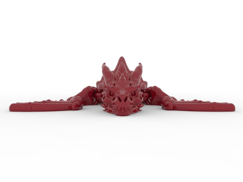 May include: A maroon dragon sculpture with outstretched wings and a detailed, textured surface. The dragon's head is centered, with sharp horns and intricate facial features. The wings extend horizontally, creating a symmetrical design.