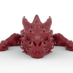 May include: A detailed, glossy, burgundy-colored dragon head sculpture. The dragon's head features sharp teeth, horns, and intricate facial details. The sculpture is positioned on a white background, showcasing the dragon's form.