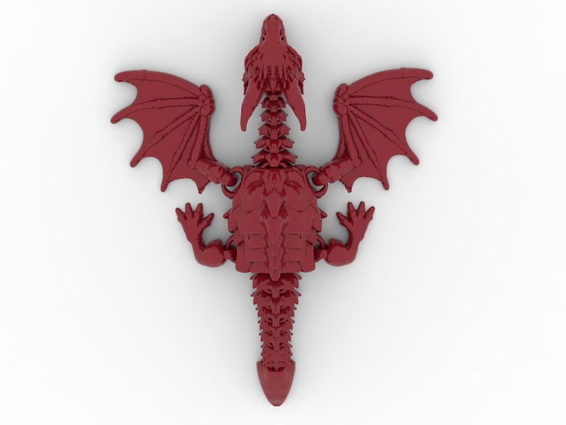 May include: A detailed, top-down view of a red dragon figurine. The dragon has outstretched wings, four legs, and a long tail. The figurine is a solid, three-dimensional object with intricate details.