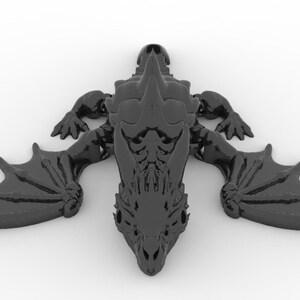 May include: A black dragon figurine with outstretched wings, detailed scales, and a menacing expression. The dragon's wings are spread wide, and its claws are visible. The figurine is a dark, glossy black, and is set against a white background.
