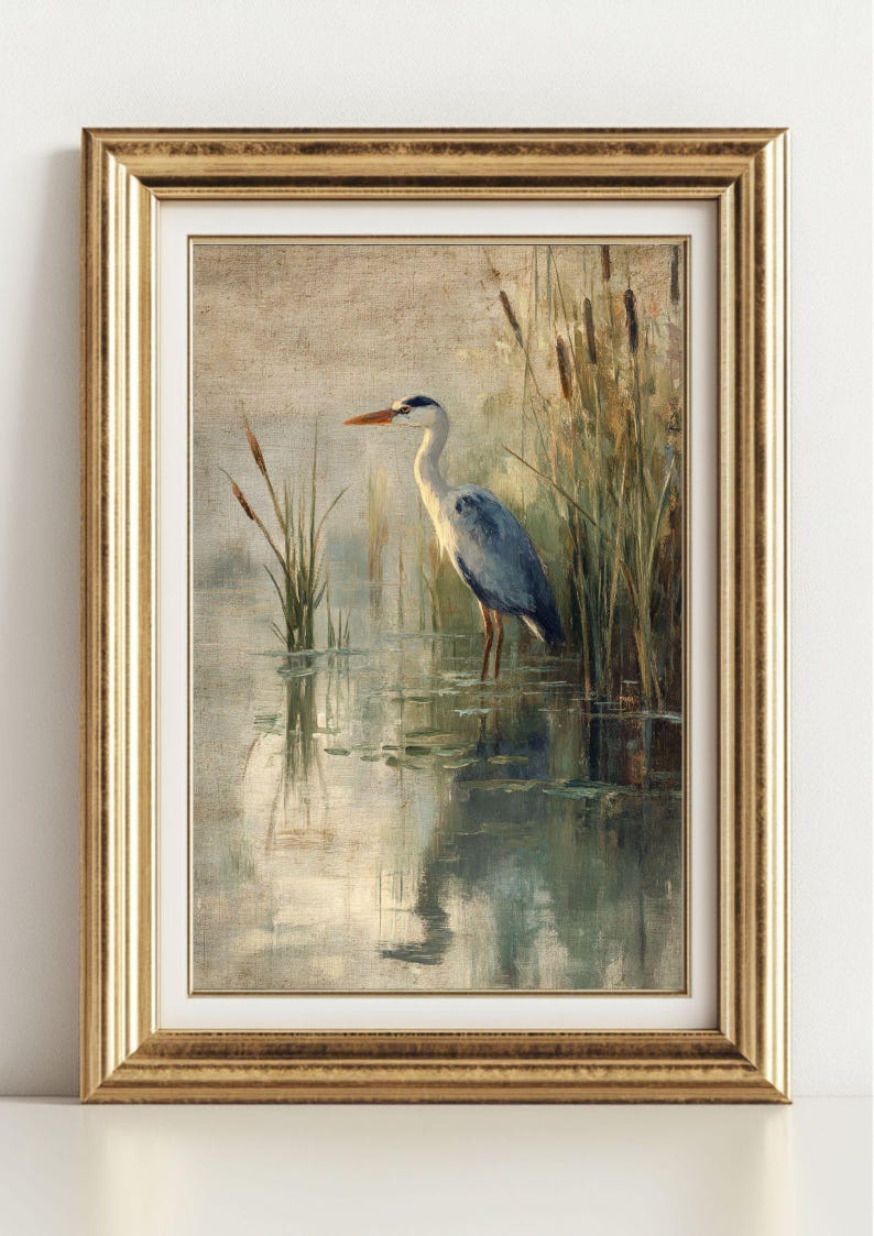 May include: A painting of a grey heron standing in a pond with reeds in the background. The heron is facing to the right and has its head turned to the left. The water is a light blue color and the reeds are a dark green color.