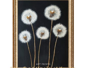 May include: A framed art print featuring five white dandelion seed heads against a black background. The artwork is in a gold-colored frame. The text "ART PRINTS" and "GOGH STUDIO" are visible.