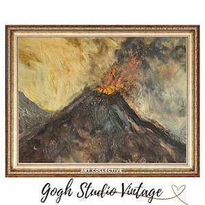 May include: A framed painting of a volcano erupting with orange and red lava. The painting is in a gold frame with a white mat. The painting is titled "Gogh Studio Vintage" in black cursive text.