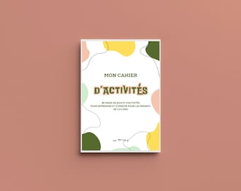 Op de afbeelding: Een witte omslag met kleurrijke abstracte vormen en de tekst "MON CAHIER D'ACTIVITÉS" in zwart. De tekst hieronder luidt "40 PAGES DE JEUX ET D'ACTIVITÉS POUR APPRENDRE ET S'EXERCER POUR LES ENFANTS DE 2 À 5 ANS".