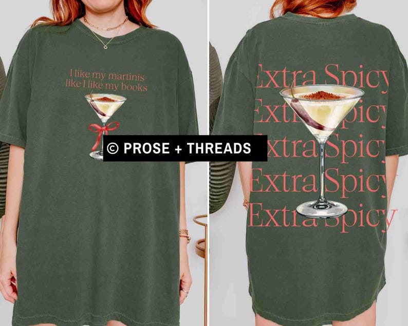 May include: Olive green t-shirt with a martini graphic and the text "I like my martinis like I like my books" on the front. The back of the shirt features a martini graphic and the words "Extra Spicy".