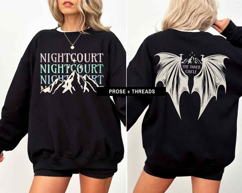 May include: Black sweatshirt with a mountain range graphic and the text "NIGHTCOURT NIGHTCOURT NIGHTCOURT". The back of the sweatshirt has a black and white graphic of a pair of wings with the text "THE INNER CIRCLE".