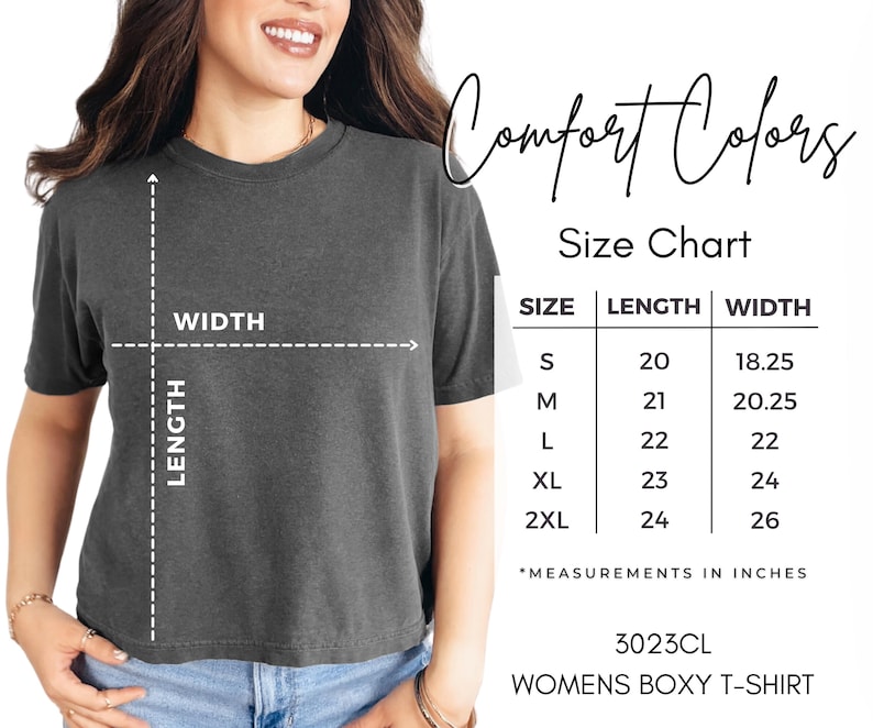 May include: A dark gray Comfort Colors boxy t-shirt with a size chart. The size chart shows measurements in inches for sizes S to 2XL. The shirt is labeled as 3023CL Womens Boxy T-Shirt.