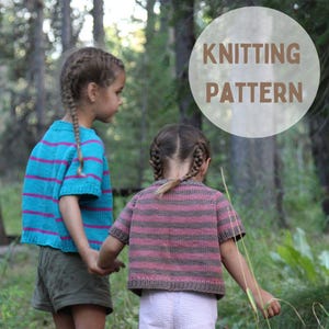 May include: Two short-sleeved knit sweaters with horizontal stripes. One sweater is bright turquoise with magenta stripes, and the other is mauve with brown stripes. The text KNITTING PATTERN is overlaid in a light circle in the upper right corner.