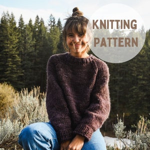 May include: A woman wearing a dark purple knitted jumper with a round neckline and long sleeves. She is sitting in a field with trees in the background. The text "Knitting Pattern" is superimposed on the image.