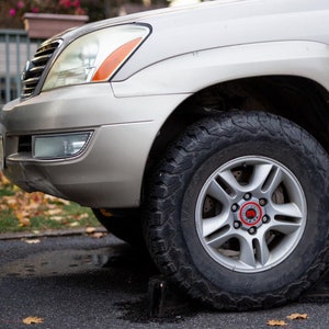Lexus GX470 03-09 Center Caps - Original Design - Available in sets of 4 or 5 - Factory 17&quot; Wheels Only