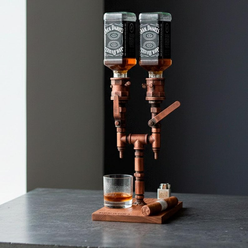 May include: A copper-toned liquor dispenser with two Jack Daniel's bottles. The dispenser has a steampunk aesthetic, with pipes and levers. A glass of amber liquid, a cigar, and a lighter sit on a wooden base.
