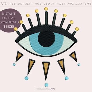 May include: Digital embroidery design featuring an eye with a blue iris, black eyelashes, and gold accents. The design includes the text "INSTANT DIGITAL DOWNLOAD 3 SIZES" in a circular shape. Available in various formats.