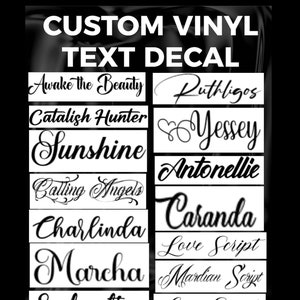 May include: A custom vinyl text decal display featuring various white script and serif fonts on a black background. The text includes phrases and names such as Awake the Beauty, Ruthligos, Catalish Hunter, Sunshine, Yessey, Antonellie, Calling Angels, Caranda, Charlinda, Love Script, Marcha, Mardian Script, and Magical Feather.