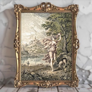 May include: An antique-style framed print with a gold-coloured ornate frame. The artwork shows a classical landscape with a woman, castle, and sheep. The frame has detailed scrollwork. The print is labelled "Lotus Aura Art Prints".