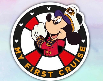 May include: A round sticker with a black border and a white background. The sticker features a cartoon image of Mickey Mouse dressed as a captain, with the text "My First Cruise" in yellow letters.